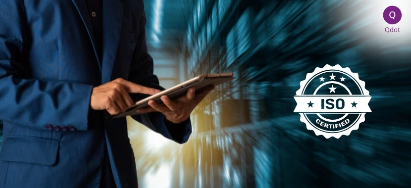  Business professional reviewing digital compliance data with ISO certification badge representing ISO certification in Saudi Arabia 2026 